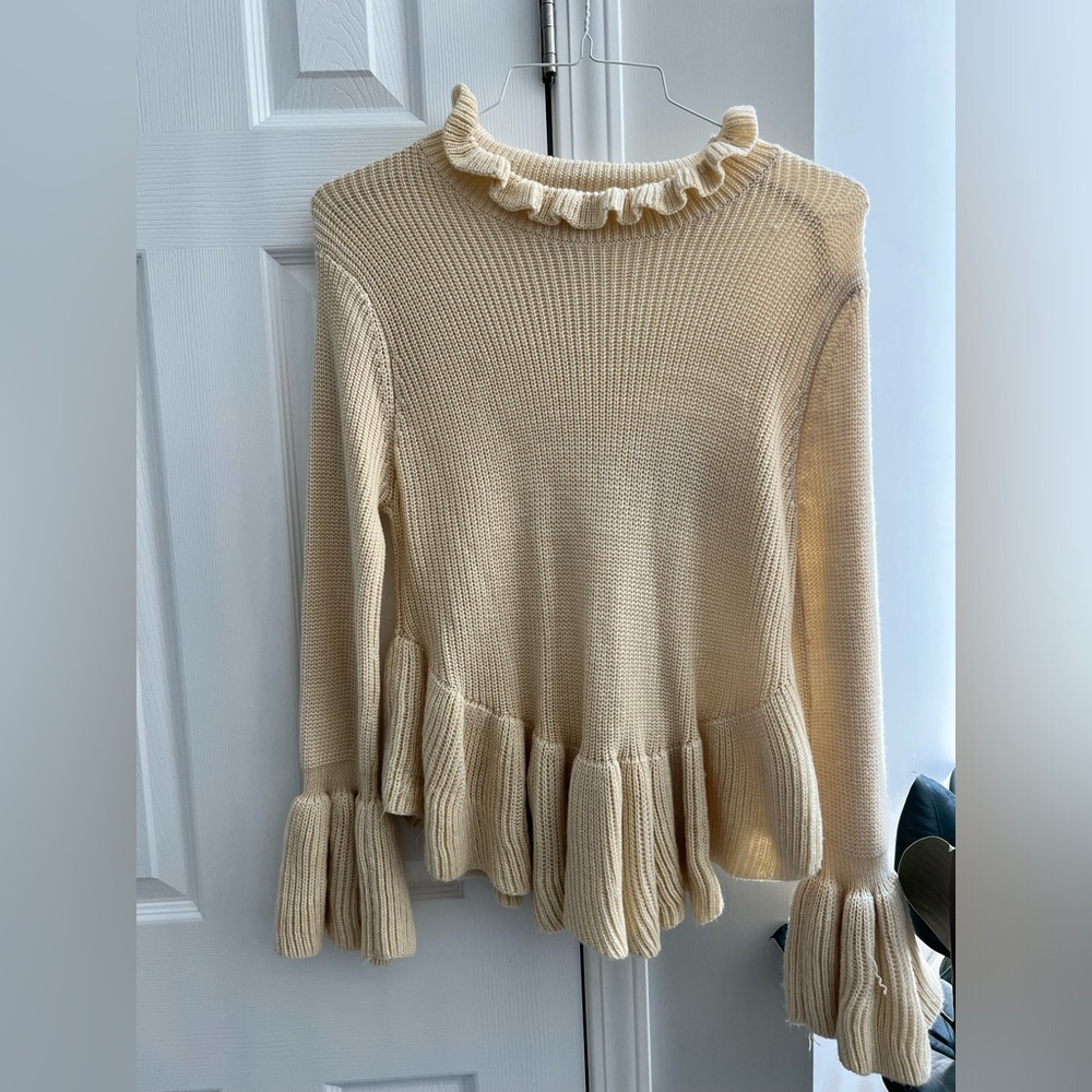 Turtleneck cream sweater